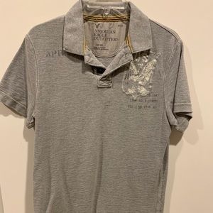 American Eagle Gray Polo. Size- Medium